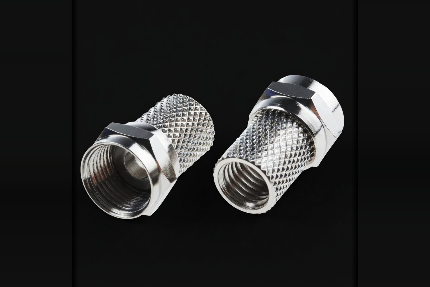 Two F Type coaxial connectors with knurled bodies