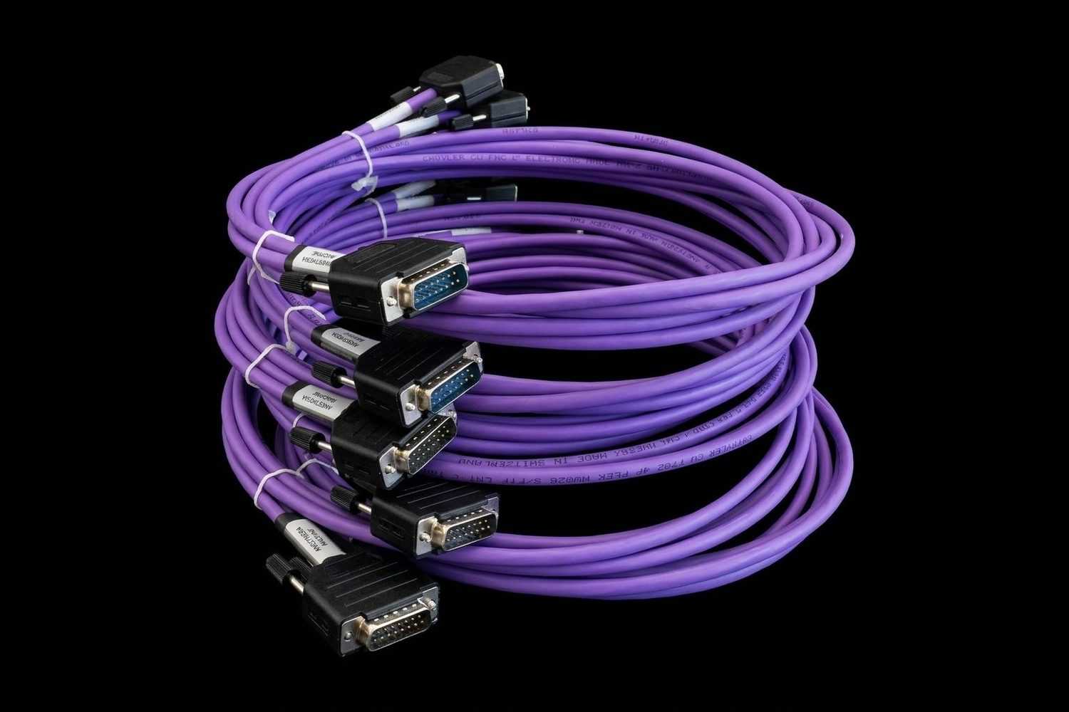 Coiled purple cables with D-sub connectors