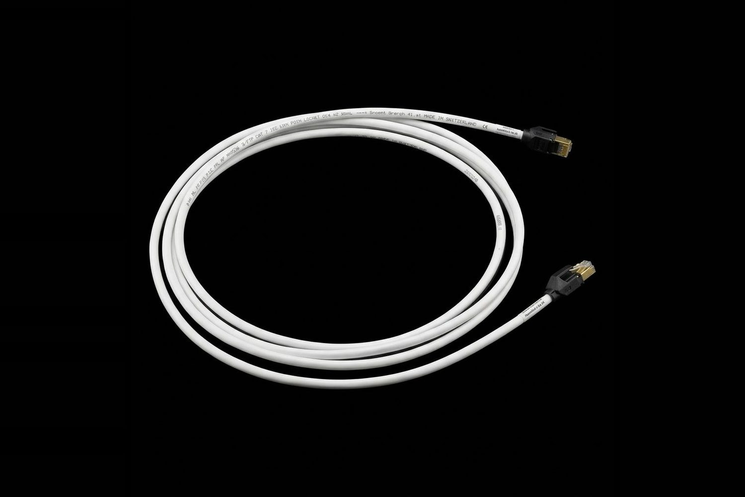 Coiled white cable assembly with connectors at each end