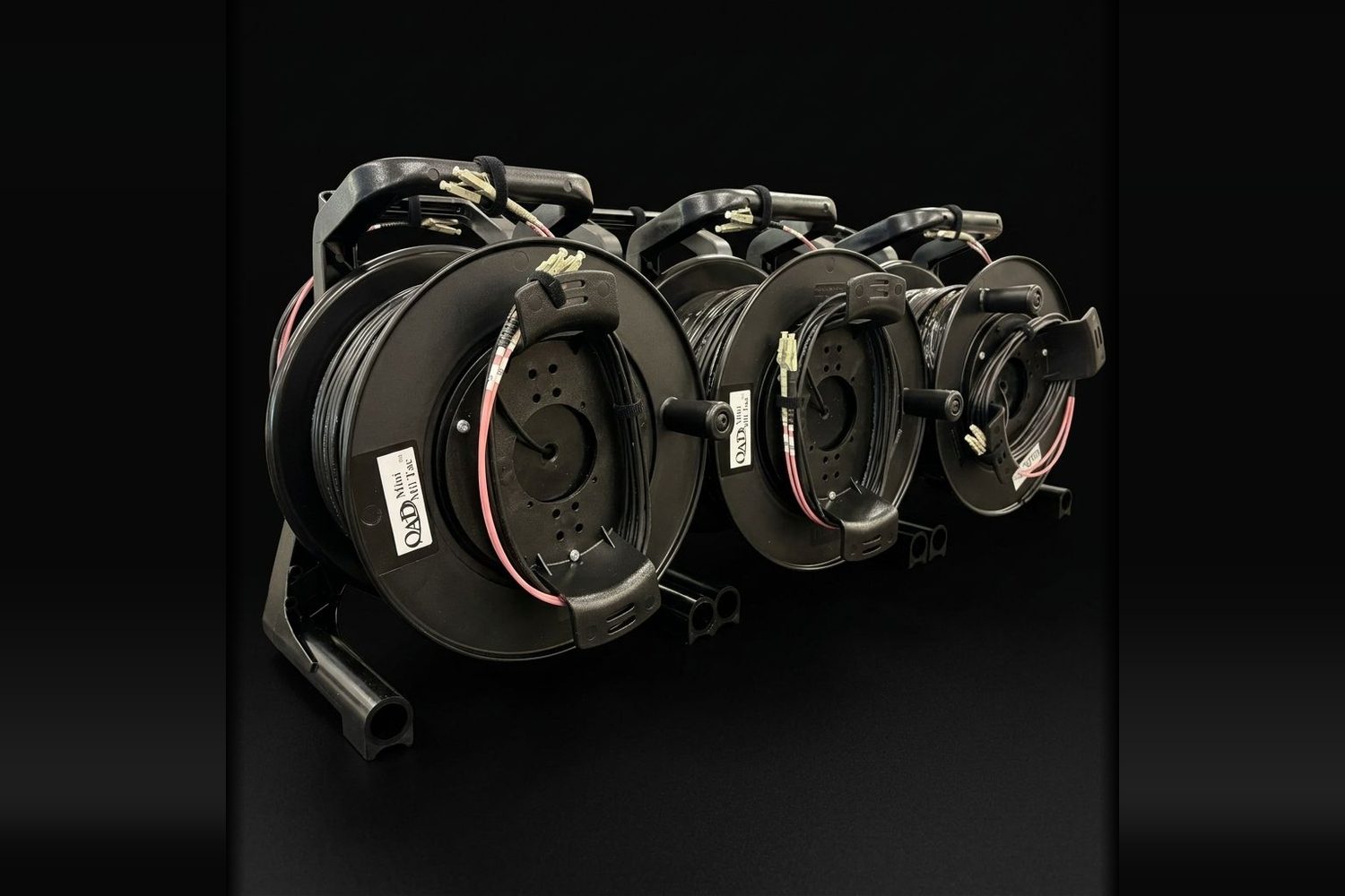 Three black Mini Mil Tac deploy reels
