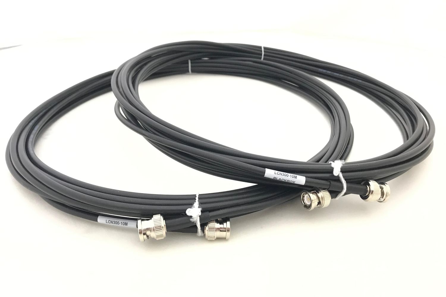 Coiled coaxial cable assemblies with BNC connectors